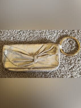 Sabina New York Gold leather clutch